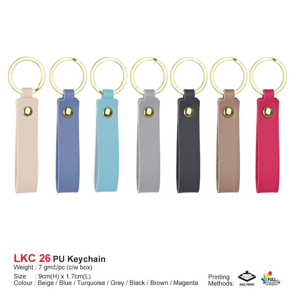 Set of seven colorful keychains on a white background