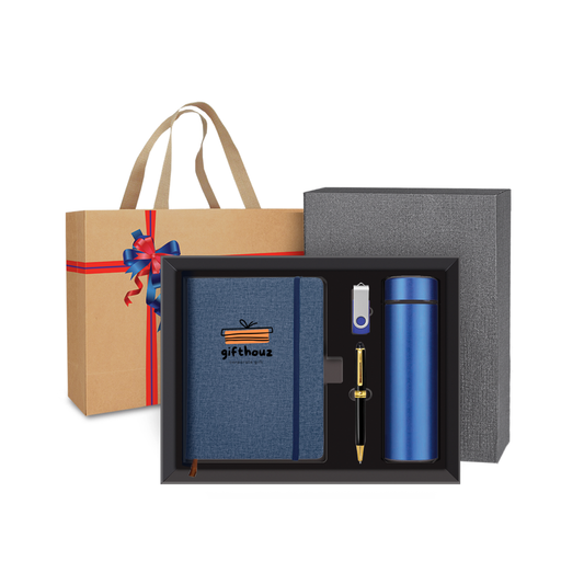 Corporate Gift set with notebook, pen, thermos, and gift bag on a white background