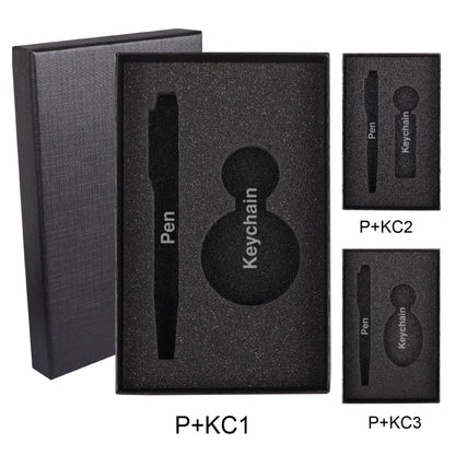 B 80 Gift Box Packaging Black foam packaging insert for a pen and keychain with cutouts for each item.