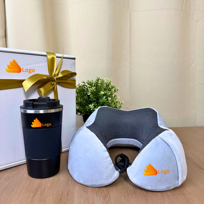 Corporate gift set GS2026C02   Neck pillow and tumbler with a logo on a wooden surface next to a gift box.