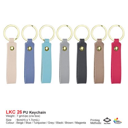 Set of seven colorful keychains on a white background